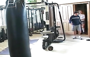 Curly teen is fucked hard in gym